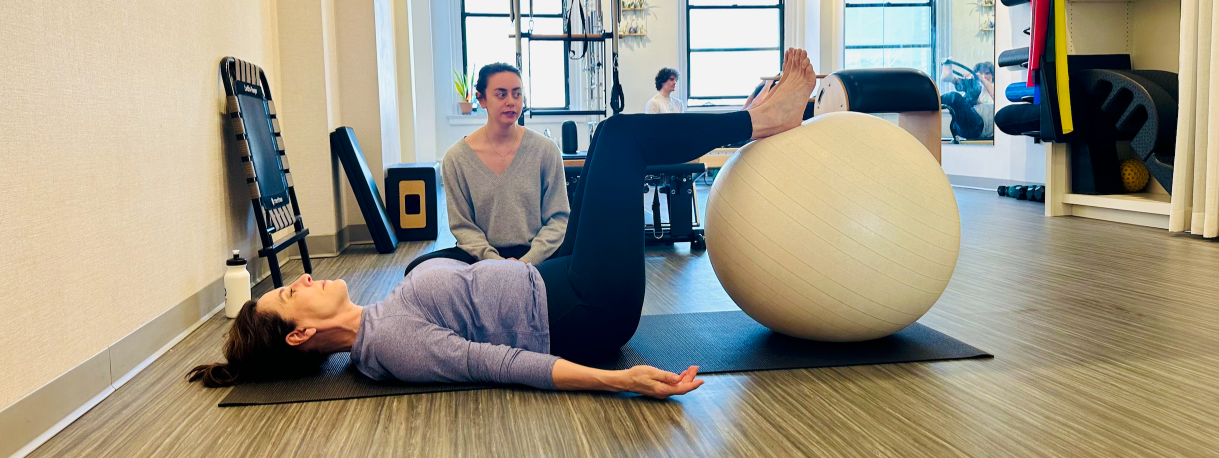 Liz working with a stability ball for back pain relief