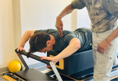 Scott Fava has a personalized pilates session.