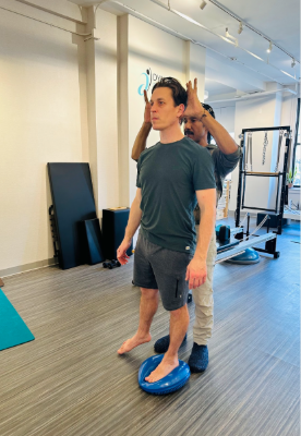 Scott Fava in a personalized, one-on-one pilates session.