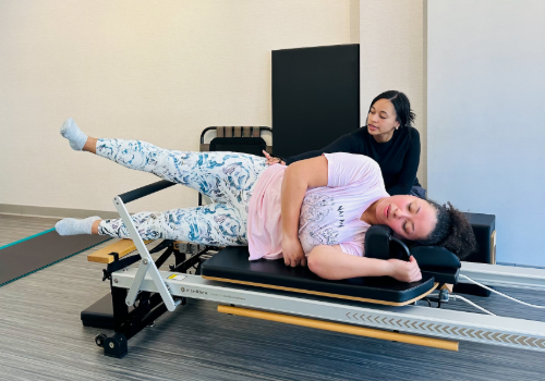Jess addresses joint pain in her hips at a Private Pilates session at DBP.